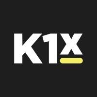 K1X logo featuring white text and a yellow underline accent on a dark background.